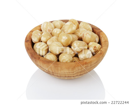 peeled and cleaned hazelnut kernels in wood bowl peeled and cleaned hazelnut kernels in wood bowl 22722244