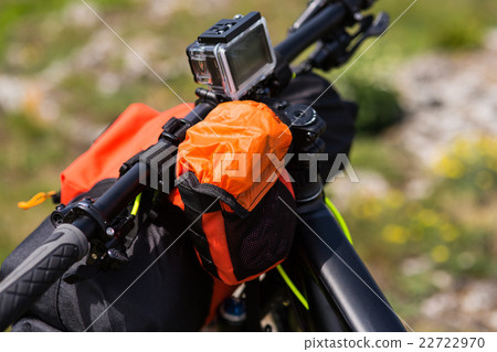 Bicycle with orange bags for travel 22722970