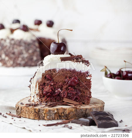 Black forest cake with whipped cream and cherries 22723306
