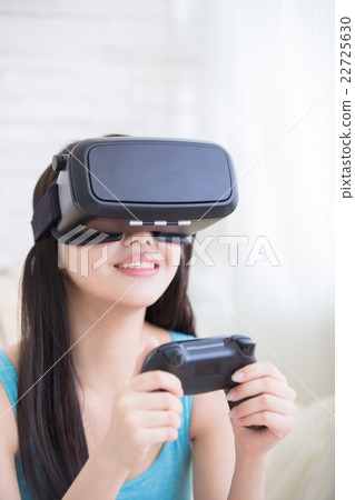 woman playing games with vr woman playing games with vr 22725630