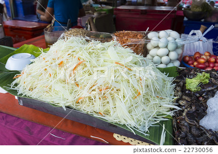 A set of Ingredients for making papaya salad 22730056