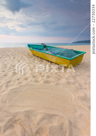 Small boat on the beach with sand sign for writing 22730334