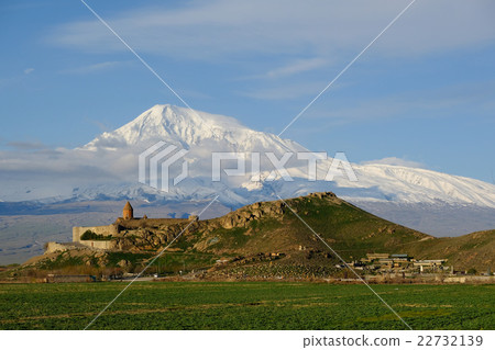 Ancient monastery in front of mountain 22732139