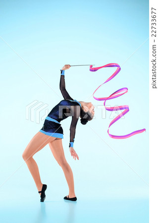 The girl doing gymnastics dance with colored The girl doing gymnastics dance with colored 22733677