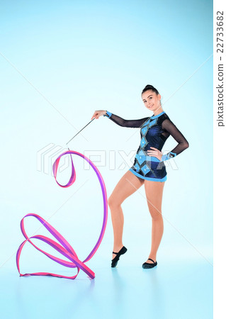 The girl doing gymnastics dance with colored The girl doing gymnastics dance with colored 22733682