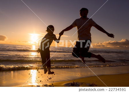 Father and son have great time on the beach Father and son have great time on the beach 22734591