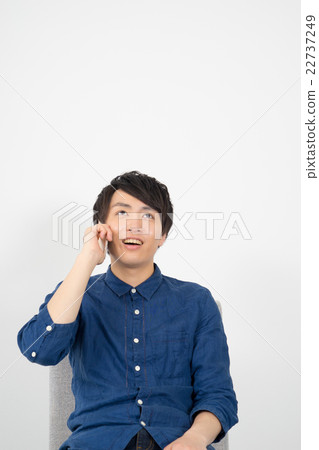 A man who makes a phone call 22737249