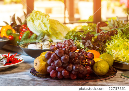 Grape and lime on plate. 22737861