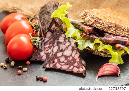 sandwich with sausage and vegetable 22738797