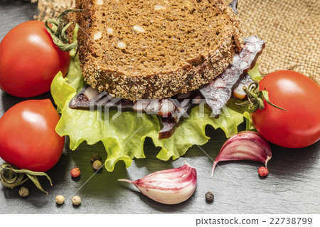 sandwich with sausage and vegetable 22738799