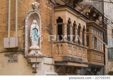 Statue of a saint on a house, Senglea,island Malta Statue of a saint on a house, Senglea,island Malta 22739395