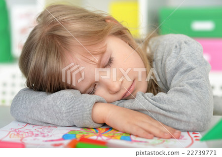 student girl sleeping on books student girl sleeping on books 22739771
