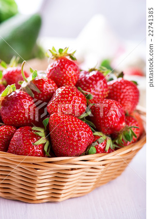 Fresh strawberry harvest in the basket Fresh strawberry harvest in the basket 22741385