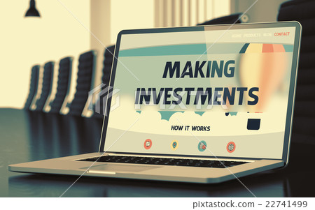 Making Investments on Laptop in Meeting Room. Making Investments on Laptop in Meeting Room. 22741499