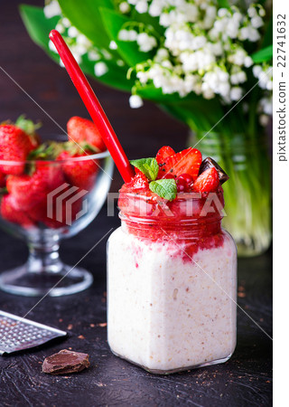 Healthy overnight oats with strawberry in jars 22741632