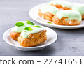 cream dessert eclair with fresh mint leaves 22741653