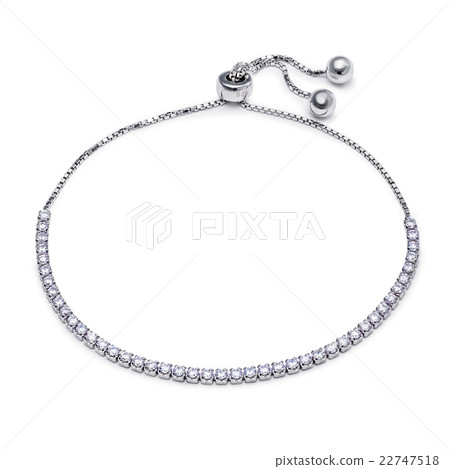 Close-up of silver bracelet with diamonds Close-up of silver bracelet with diamonds 22747518