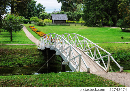 White wooden bridge in old park White wooden bridge in old park 22748474