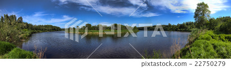 Wide panorama of a river and the forested 22750279