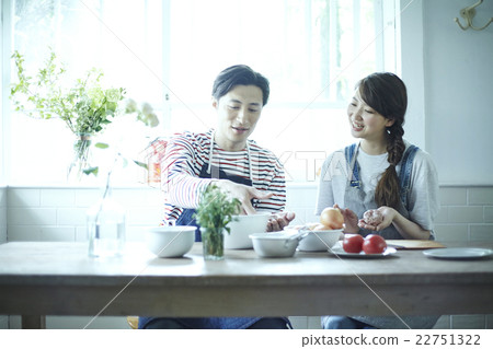 Two people living home cooking 22751322