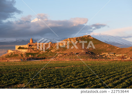 Ancient monastery in front of mountain 22753644