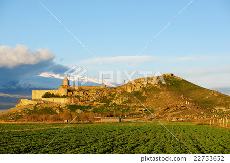 Ancient monastery in front of mountain 22753652