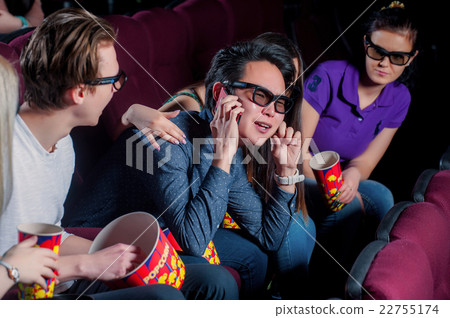 People in the cinema wearing 3d glasses 22755174