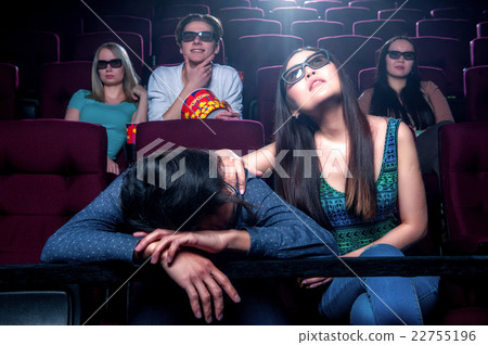 People in the cinema wearing 3d glasses 22755196