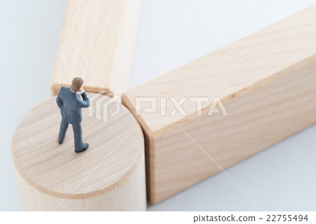 A businessman standing at a turning point A businessman standing at a turning point 22755494