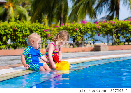 Little kids in swimming pool Little kids in swimming pool 22759741