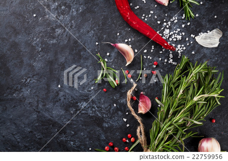 Herbs and spices over black stone 22759956