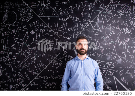 Hipster teacher against big blackboard with Hipster teacher against big blackboard with 22760180
