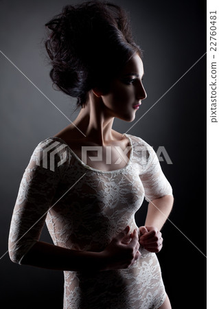 Shot of brunette posing in lace bodysuit like doll 22760481