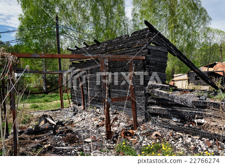 Remains of burned down house 22766274