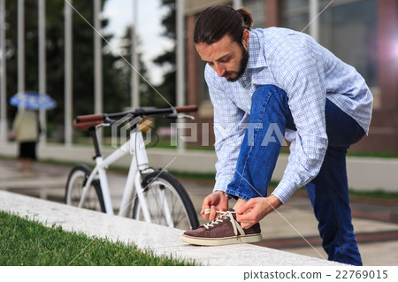 young hipster man with fixed gear bike on city young hipster man with fixed gear bike on city 22769015