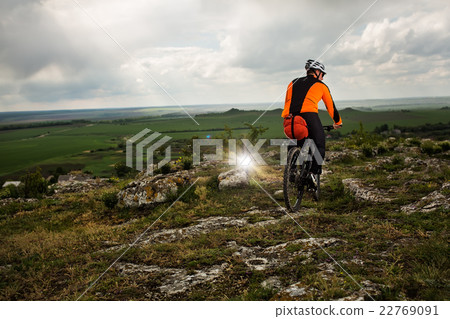 Young man is riding bicycle outside. Healthy Young man is riding bicycle outside. Healthy 22769091