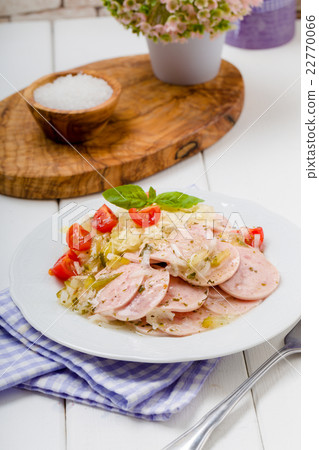Sausage salad with tomatoes and coleslaw Sausage salad with tomatoes and coleslaw 22770066