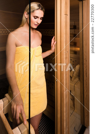 Beautiful woman leaving sauna Beautiful woman leaving sauna 22770300