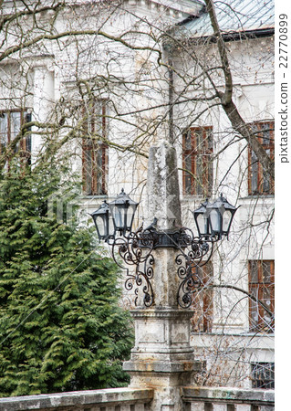 Old decorative lamps and facade of building 22770899