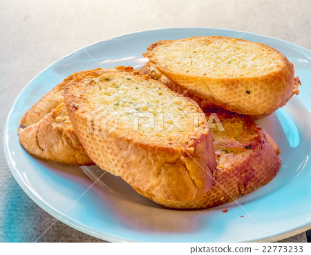 Garlic bread on table 22773233