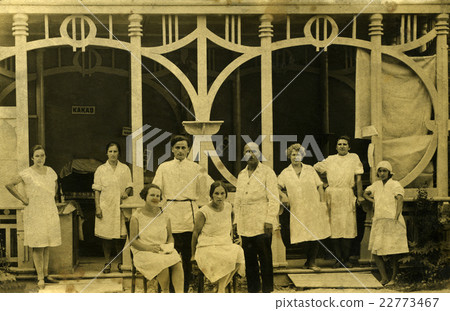 Very old black and white photo of a group restaurant workers. 22773467