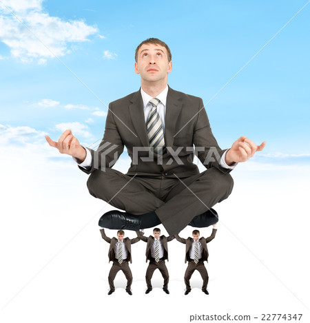 Young businessman relaxing on set of businessmen 22774347