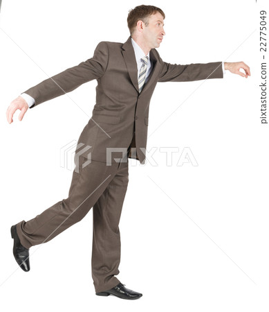 Businessman balancing on one leg 22775049