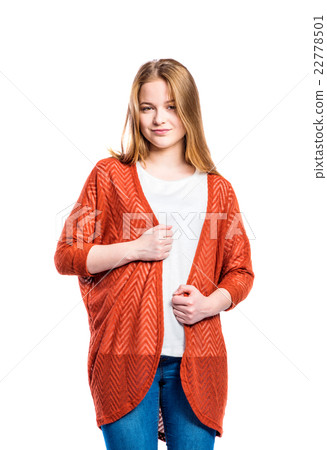 Girl in jeans and long sweater, woman, studio shot 22778501