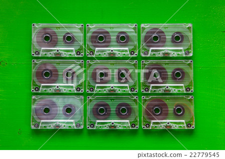Set of old audio cassettes on wooden table. 22779545