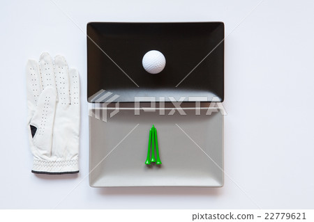 Different ceramic dishes with golf glove Different ceramic dishes with golf glove 22779621