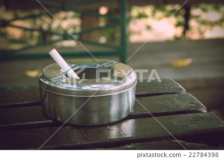 cigarette butt in ashtray, stainless ashtray 22784398