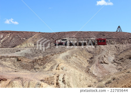 Steam locomotive running in blue sky ghost town USA 22785644