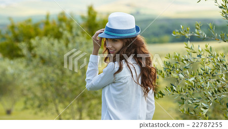 woman smiling happy on sunny summer or spring day woman smiling happy on sunny summer or spring day 22787255