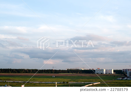 City during warm sunset 22788579